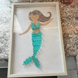 Super cute mermaid picture!!! Less than a year old. Cute for little girls room.